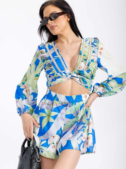 The 'Capri' Knot Romper disponible 10/6/2025